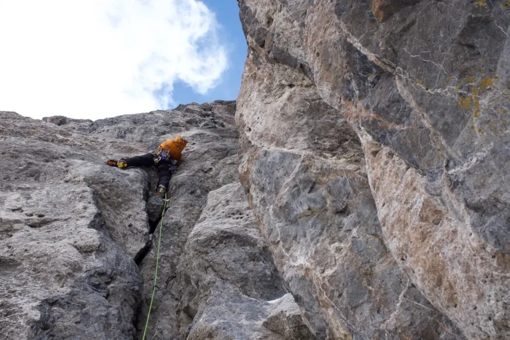 mixed alpine climbing on belay